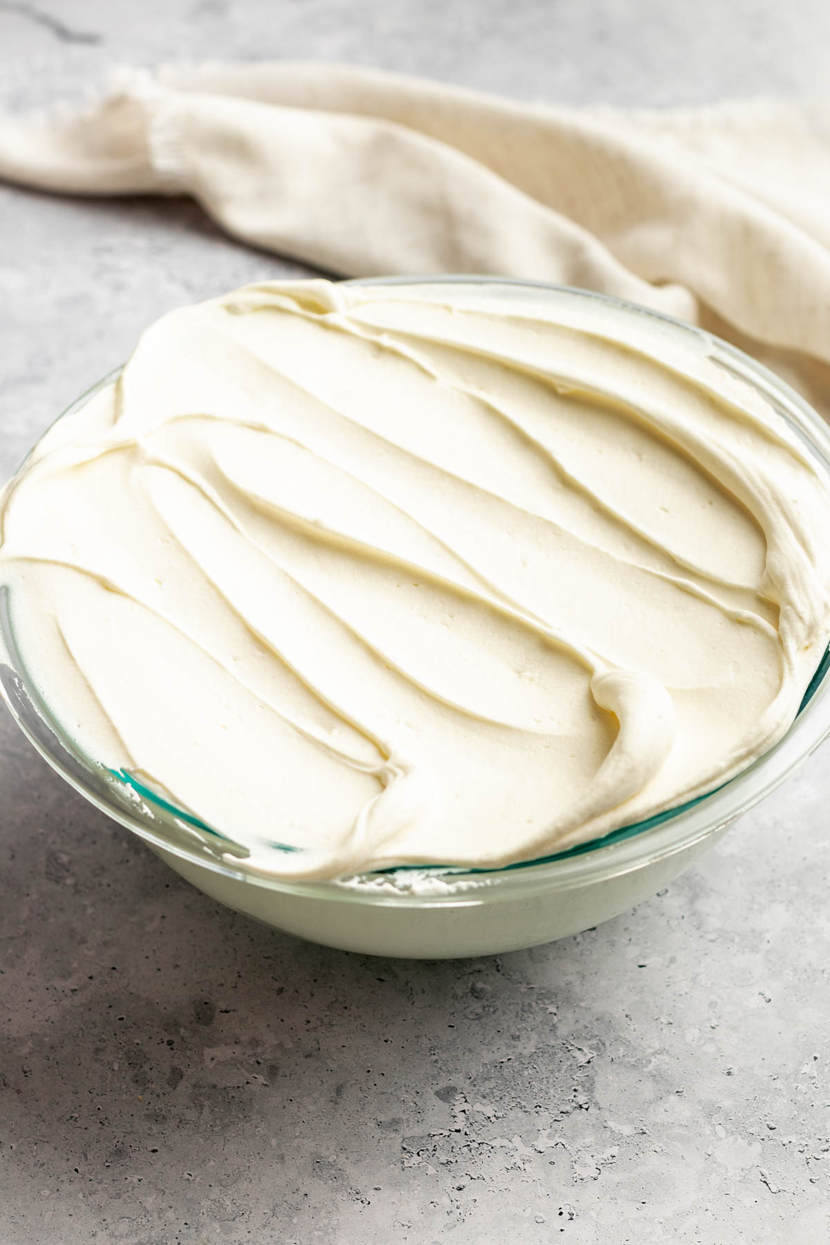 A large bowl with mascarpone whipped cream.