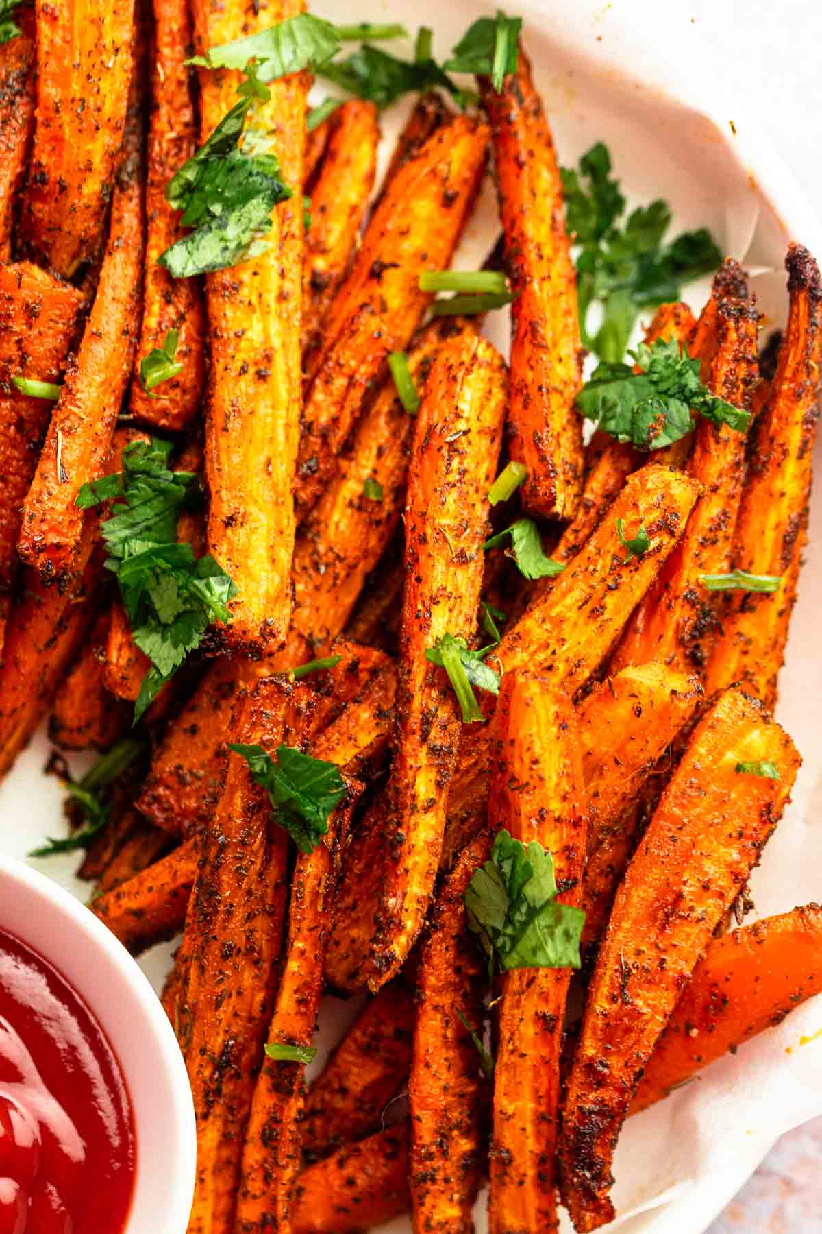 Super close up of carrot fries.