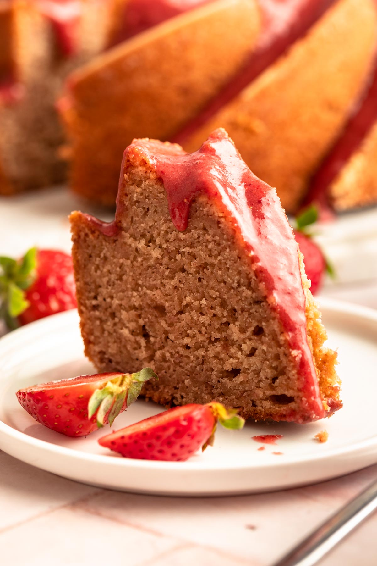 Slice of cake on a white plate.