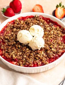 Strawberry crumble with vanilla ice cream.
