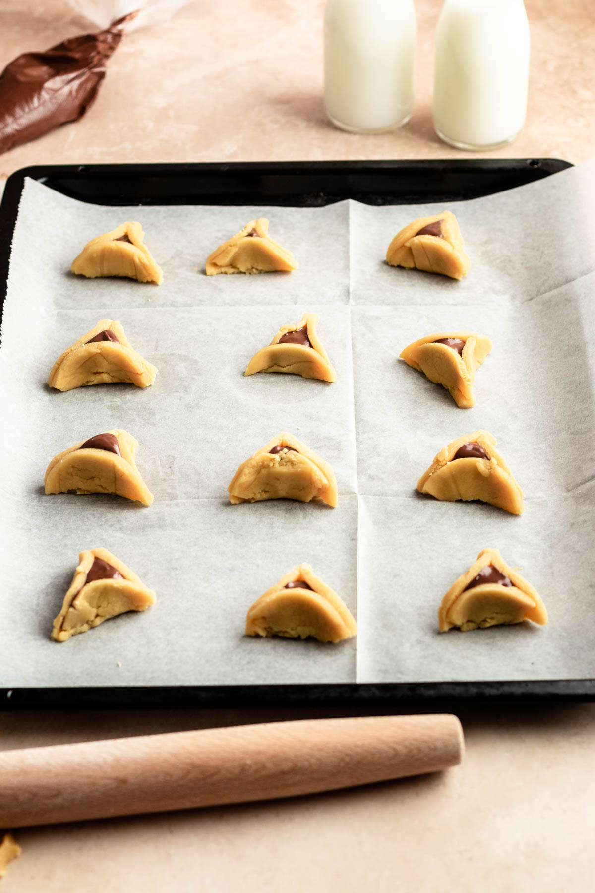 Hamantaschen Cookies on a cookie sheet.