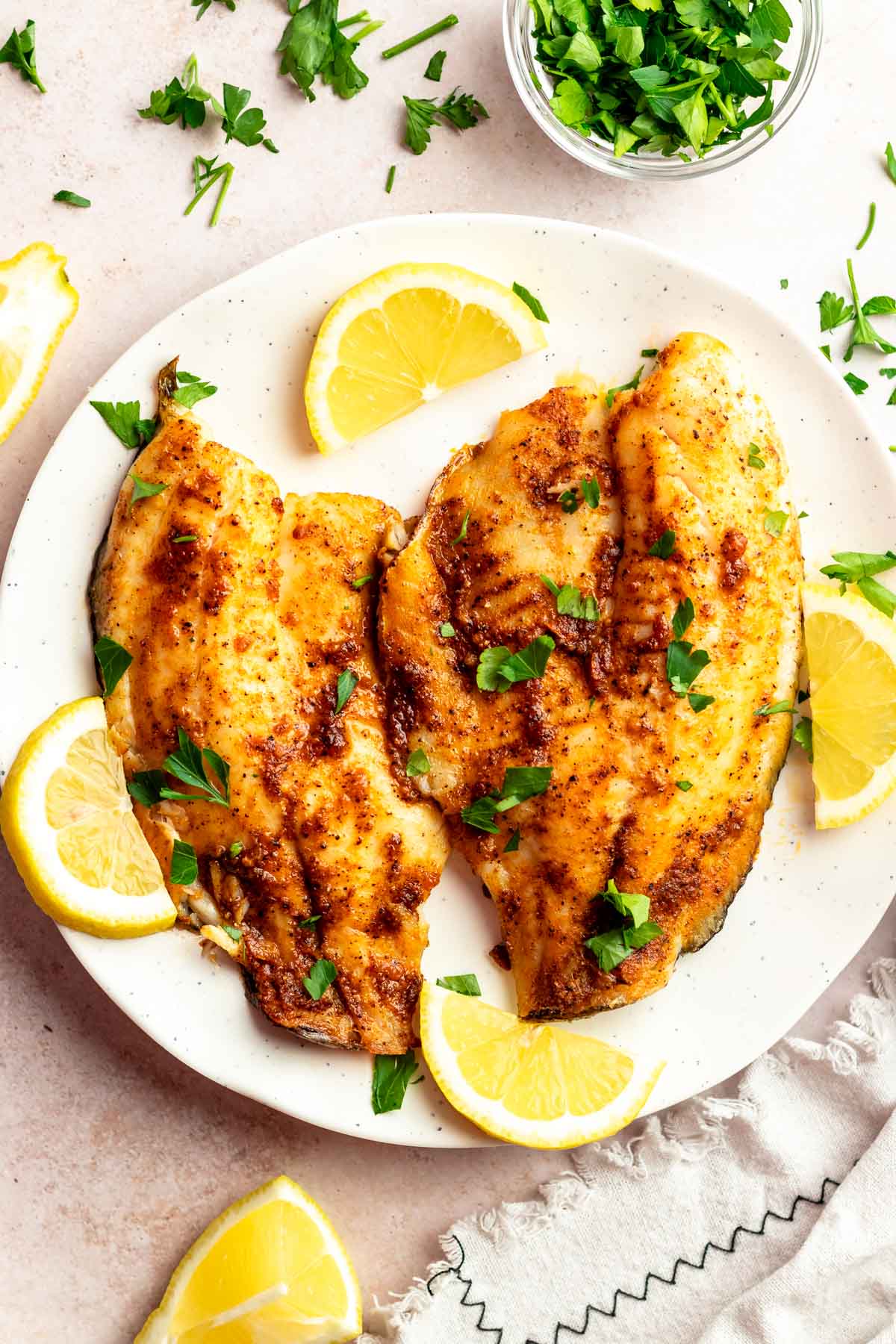 Overhead shot of air fryer tilapia fish.