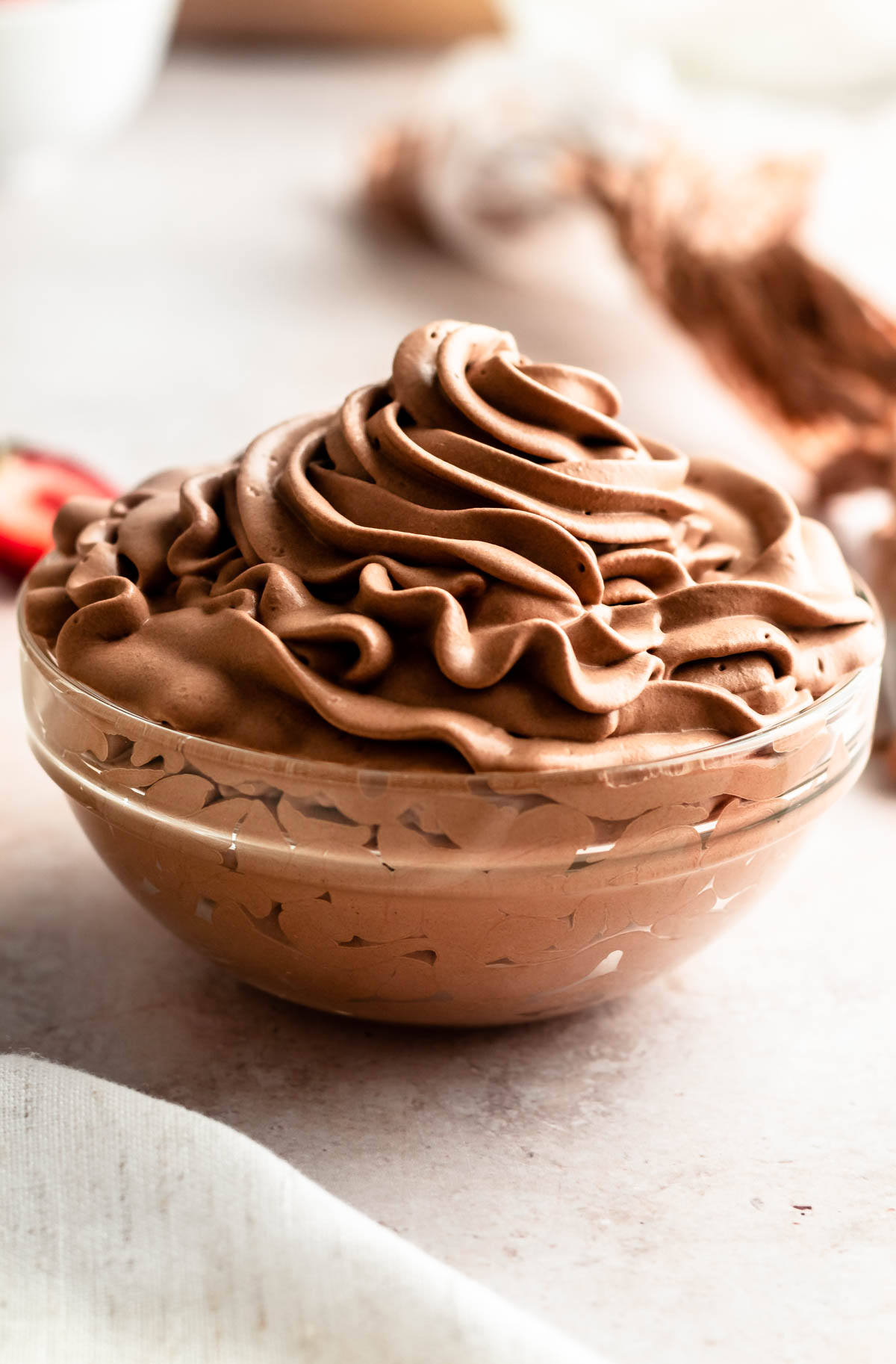 Piped chocolate whip cream in a bowl.