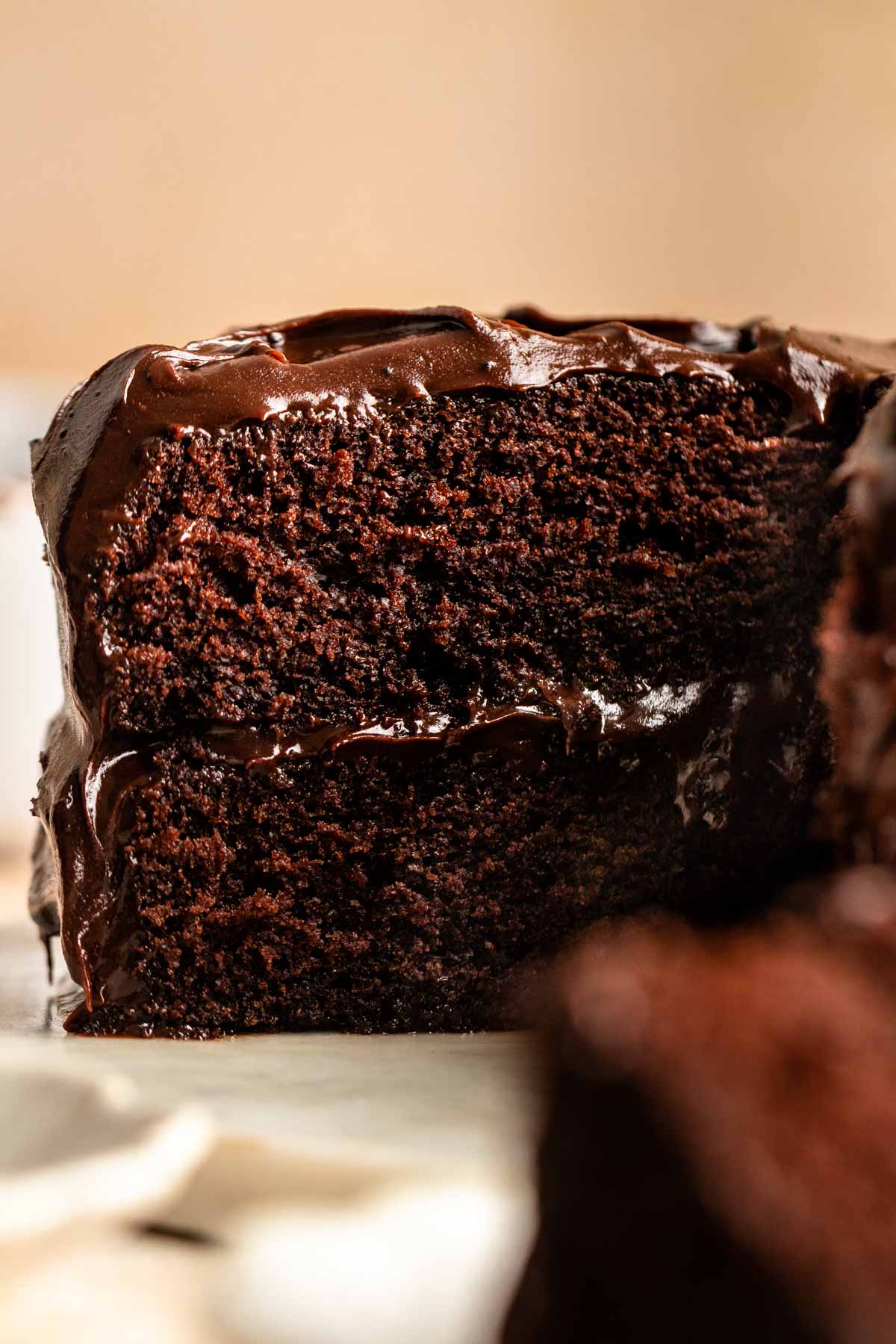 Close up of chocolate cake sliced open.