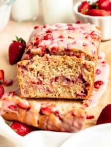 Sliced strawberry bread on a parchment paper.