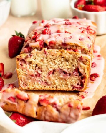 Sliced strawberry bread on a parchment paper.