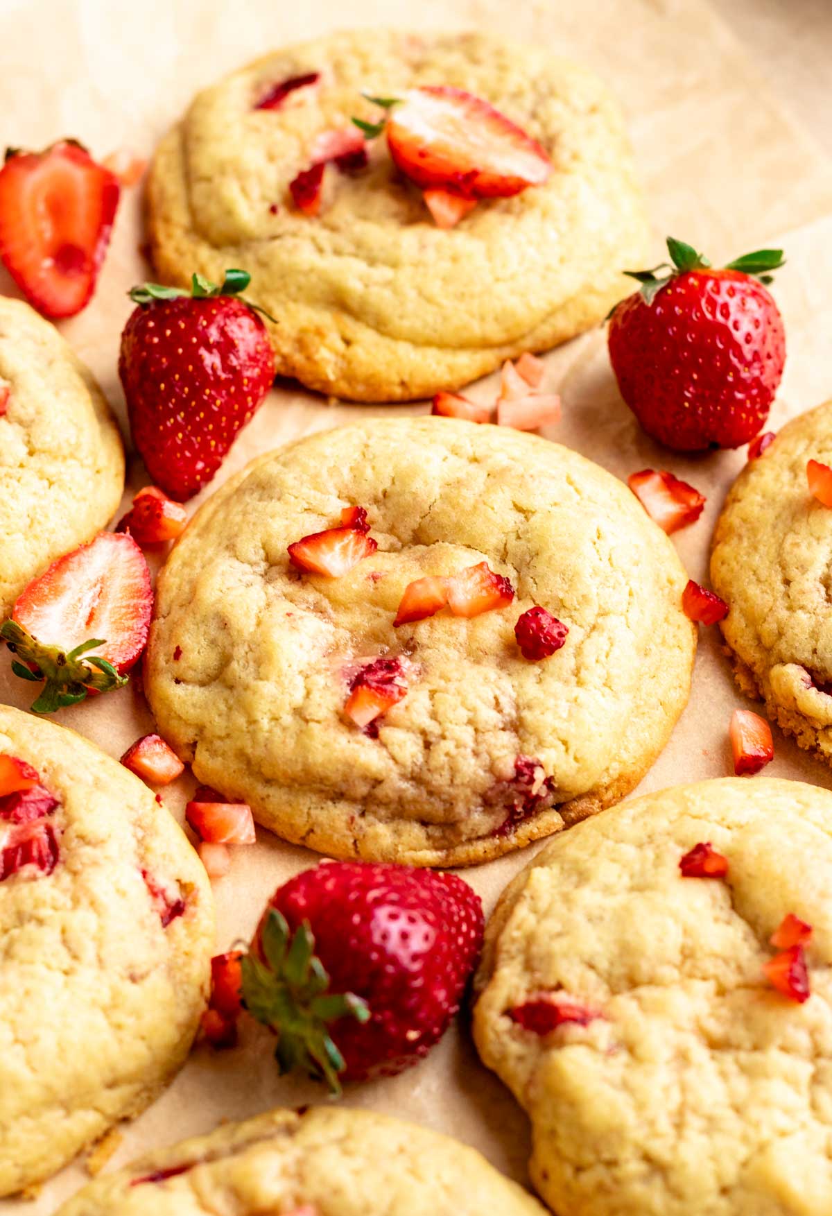 Strawberry cream cheese cookies on a parchment paper.