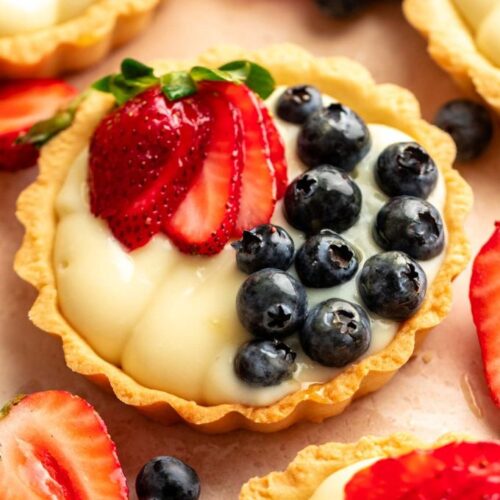 Close up of mini fruit tarts.