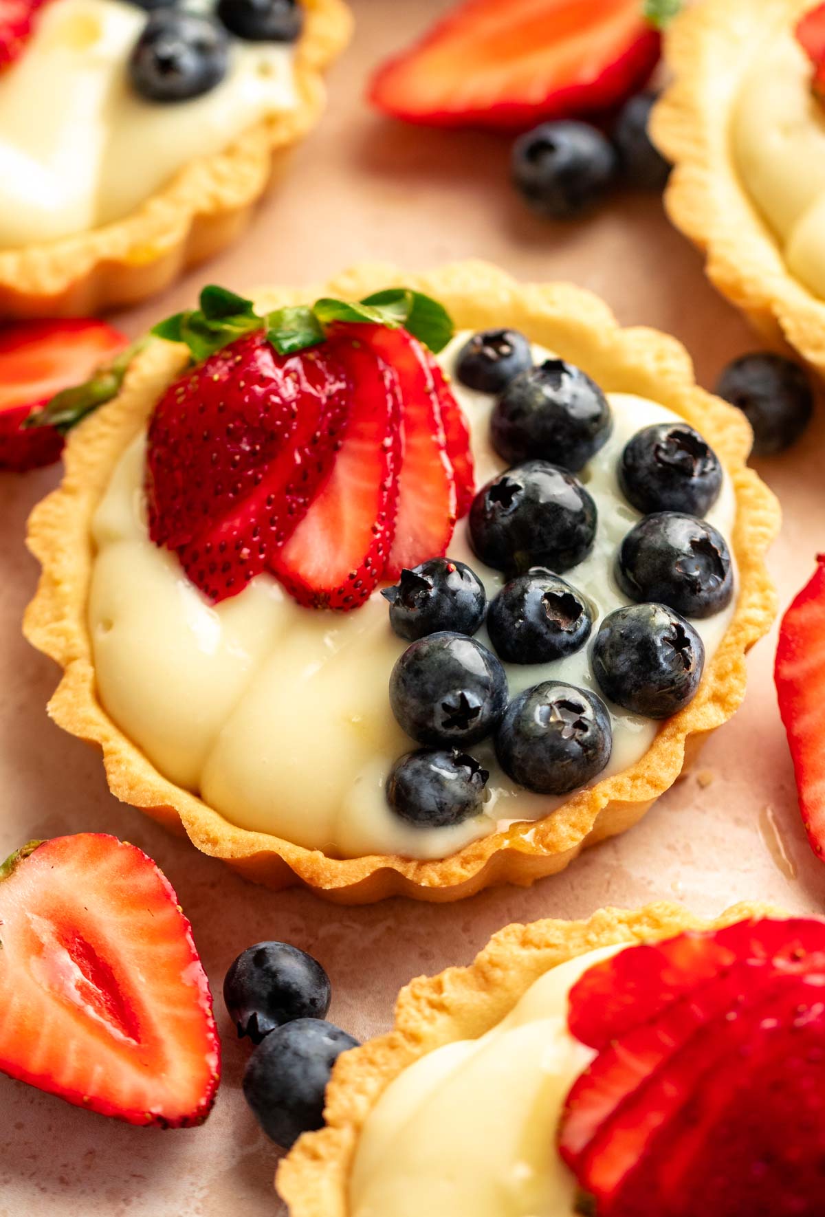 Close up of mini fruit tarts.