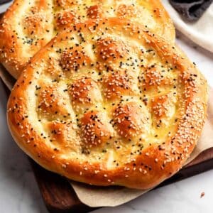 Turkish bread on a wooden board.