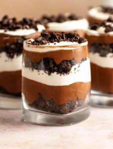 Close up shot of chocolate parfait in a cup.