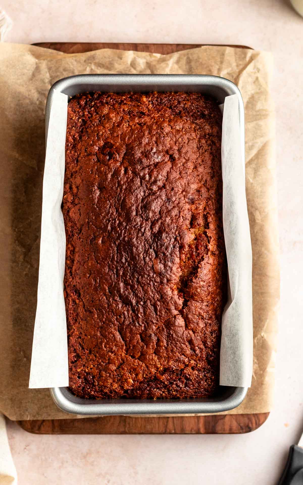 Top of a loaf of three ingredient banana bread.