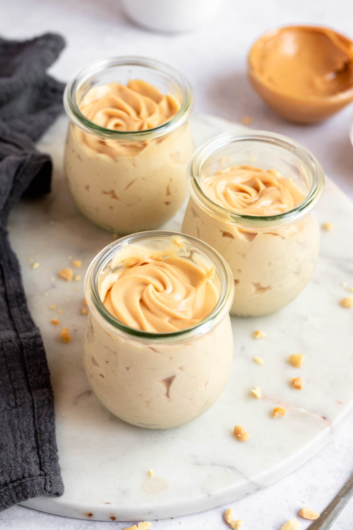 Cups with peanut butter mousse without toppings.