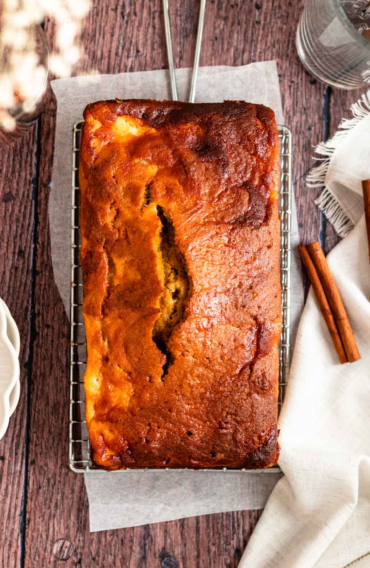 Top of a loaf of pumpkin cream cheese bread.