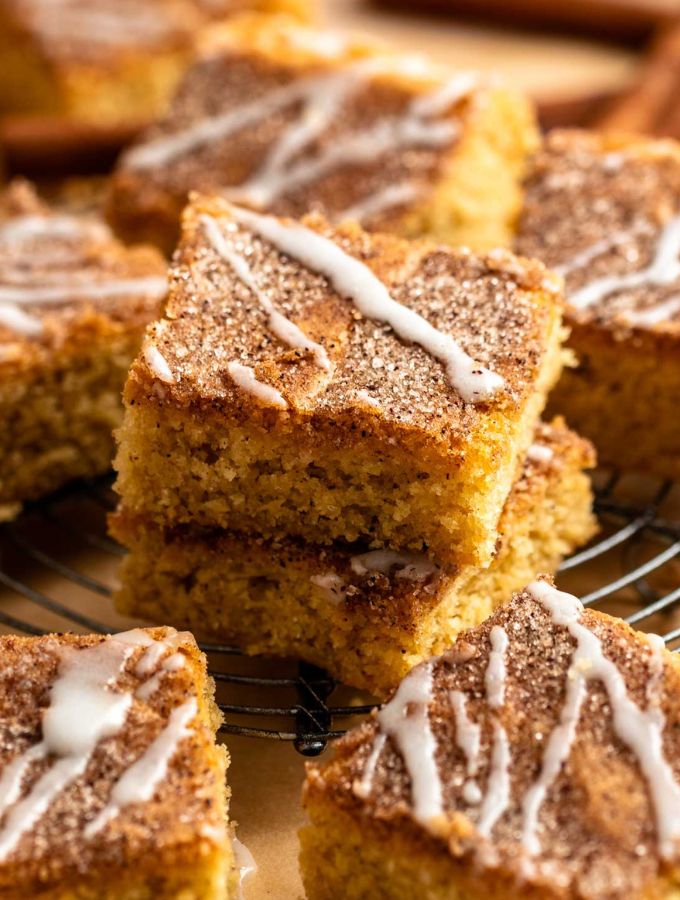 Stack of two slices of snickerdoodle bars.