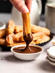 Air fryer churros dipped in nutella.