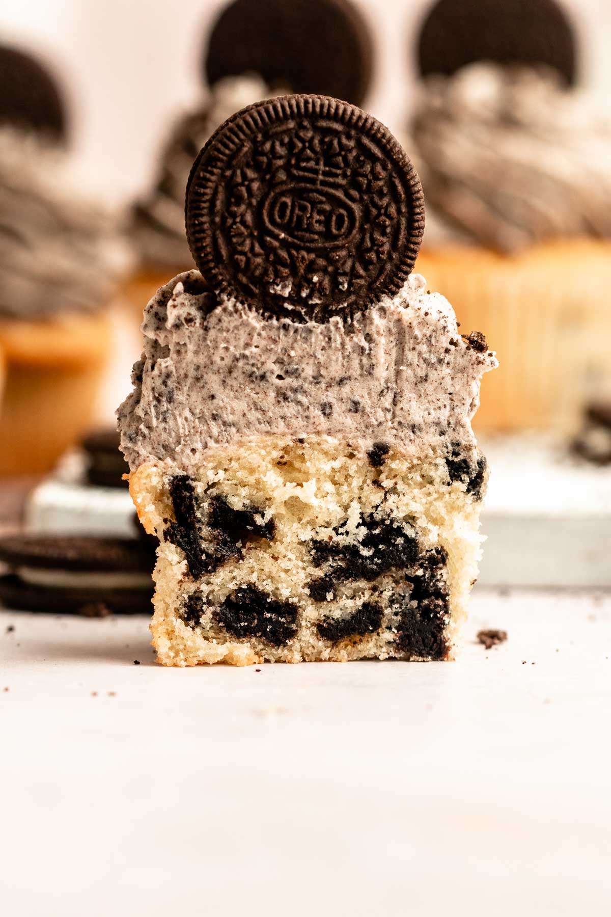 Oreo cupcake cut in half.