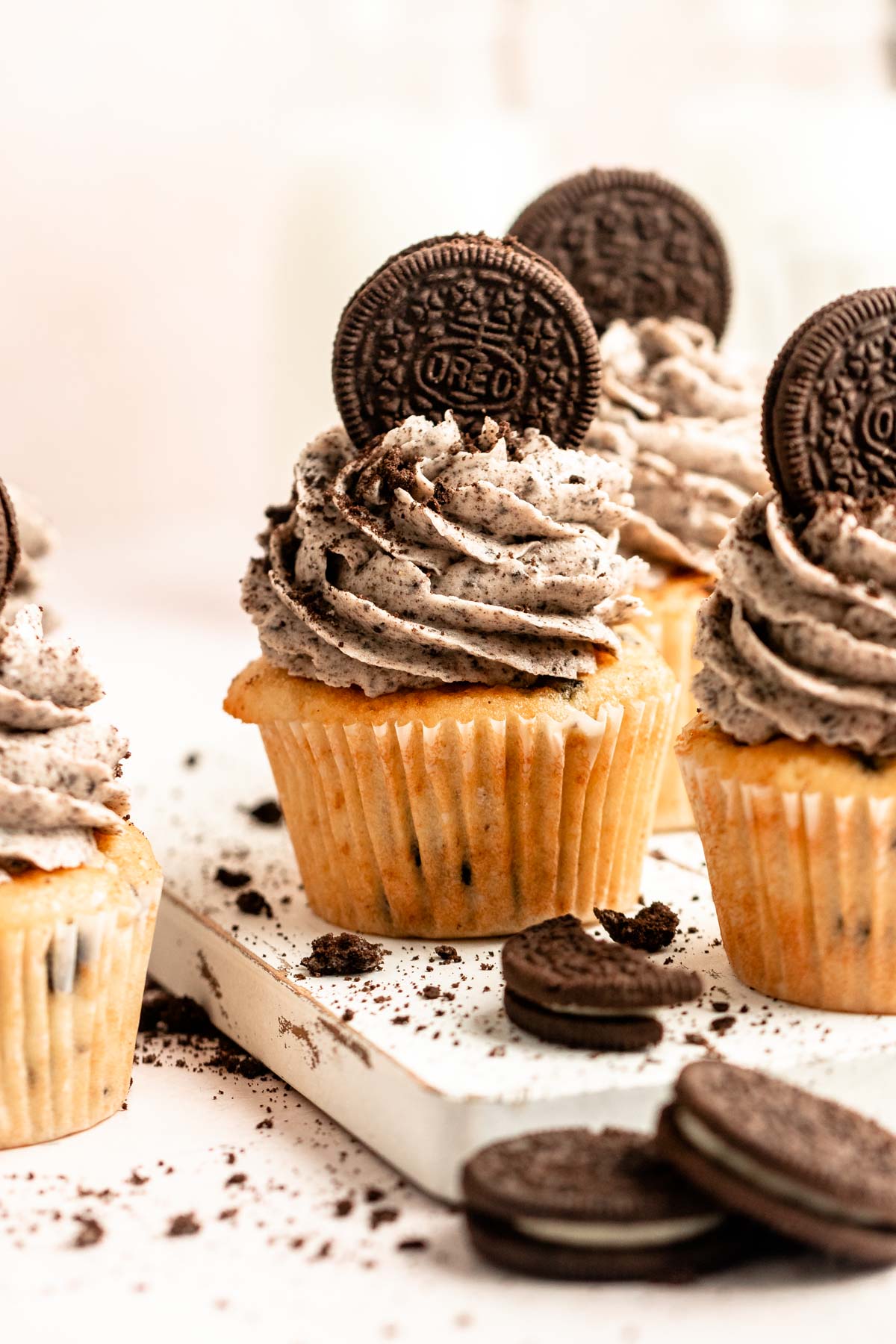 Oreo cupcakes with an Oreo on top.