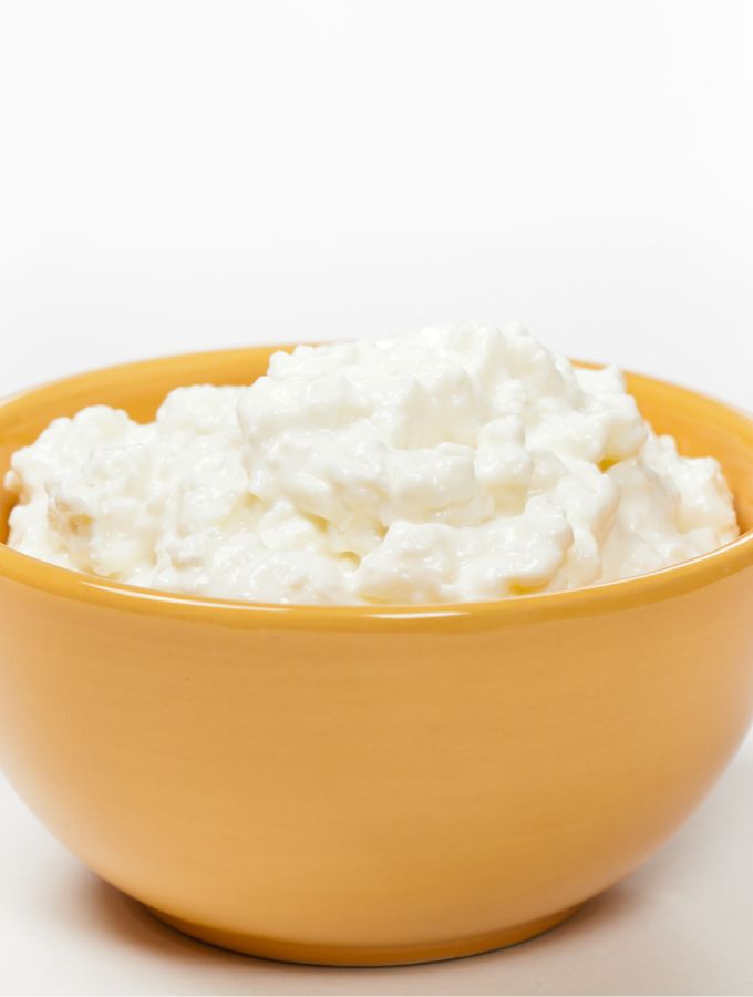 A large bowl with cottage cheese.