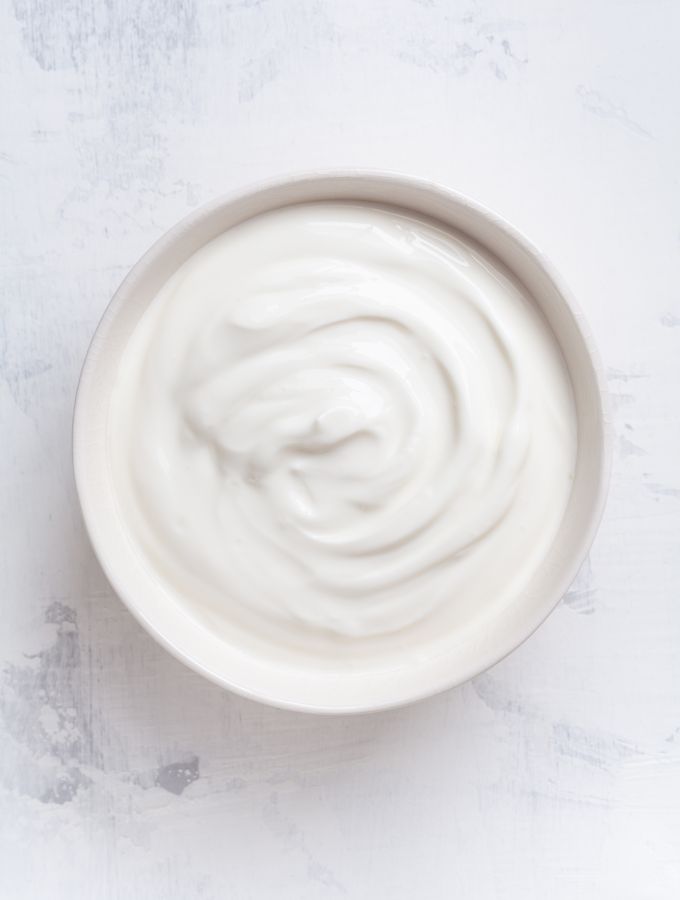 Top of a bowl with full fat Greek yogurt.