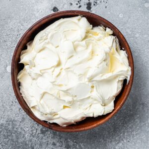 Top of a bowl with mascarpone cheese.