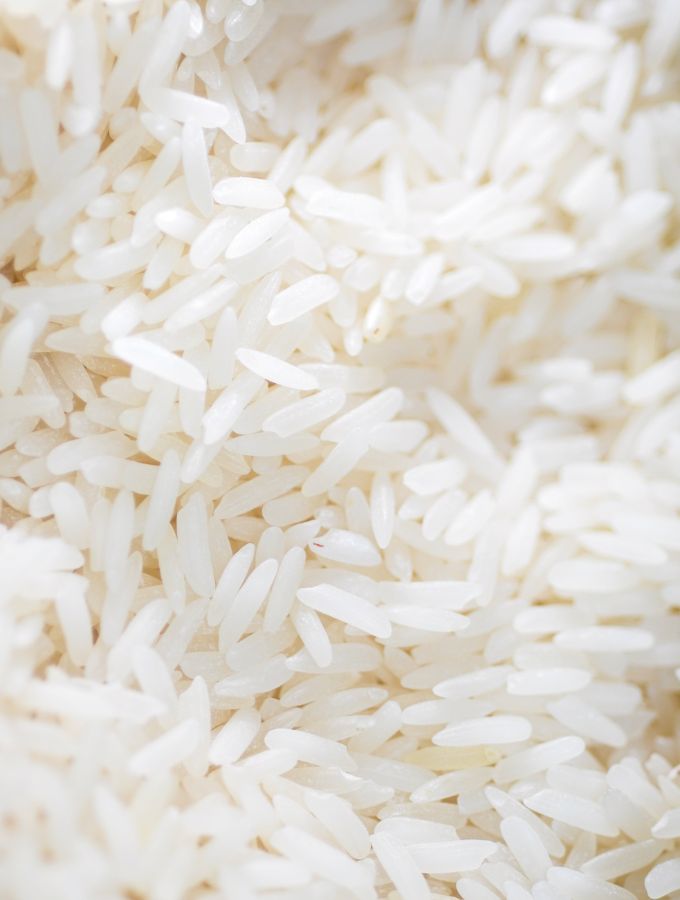 Overheard shot of uncooked white rice.