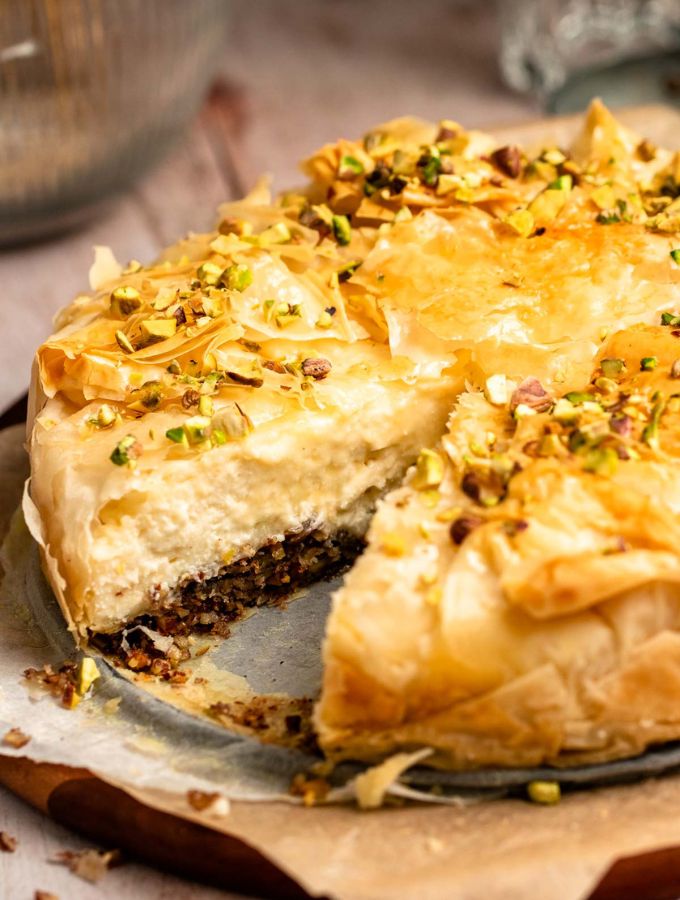Slice missing from a baklava cheesecake.