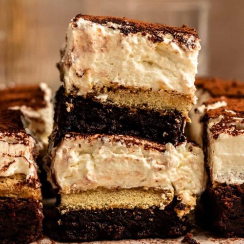 Stack of two sliced of tiramisu brownies.