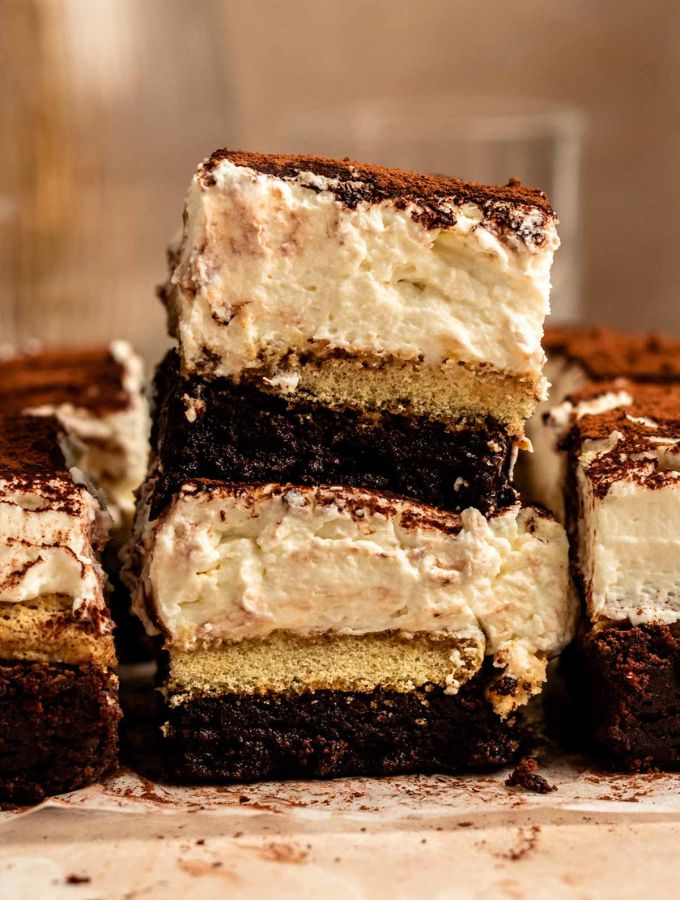 Stack of two sliced of tiramisu brownies.