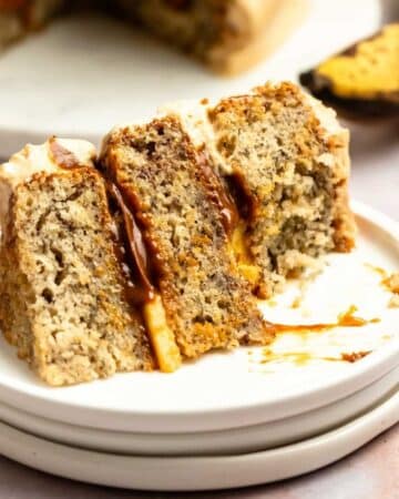 Bite missing from a slice of banoffee cake.
