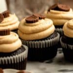 Close up shot of chocolate peanut butter cup cupcakes.