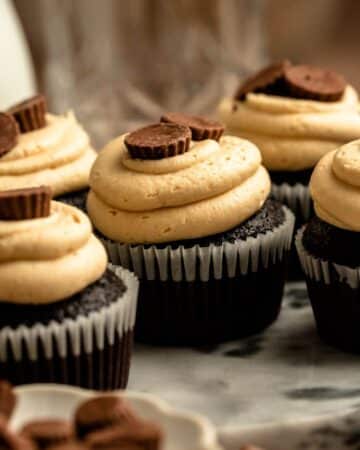 Close up shot of chocolate peanut butter cup cupcakes.