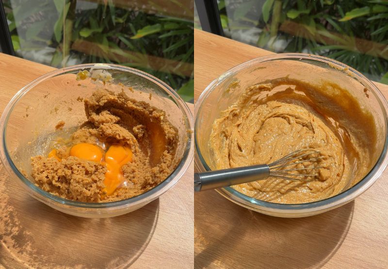 Mixing eggs into the creamed cookie butter base until smooth and creamy.