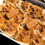 Biscoff cinnamon rolls in a baking pan.