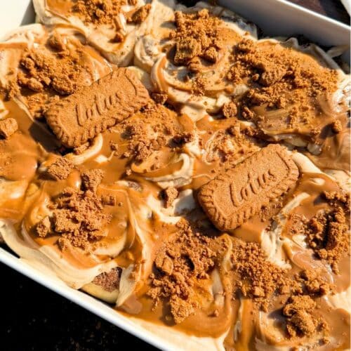 Biscoff cinnamon rolls in a baking pan.