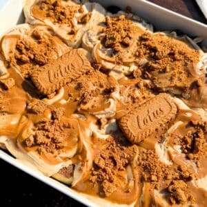 Biscoff cinnamon rolls in a baking pan.