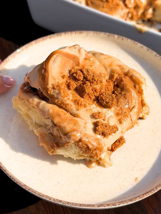 Biscoff cinnamon roll on a plate.