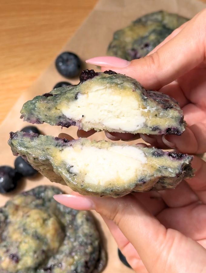 Blueberry cheesecake cookies cut in half.