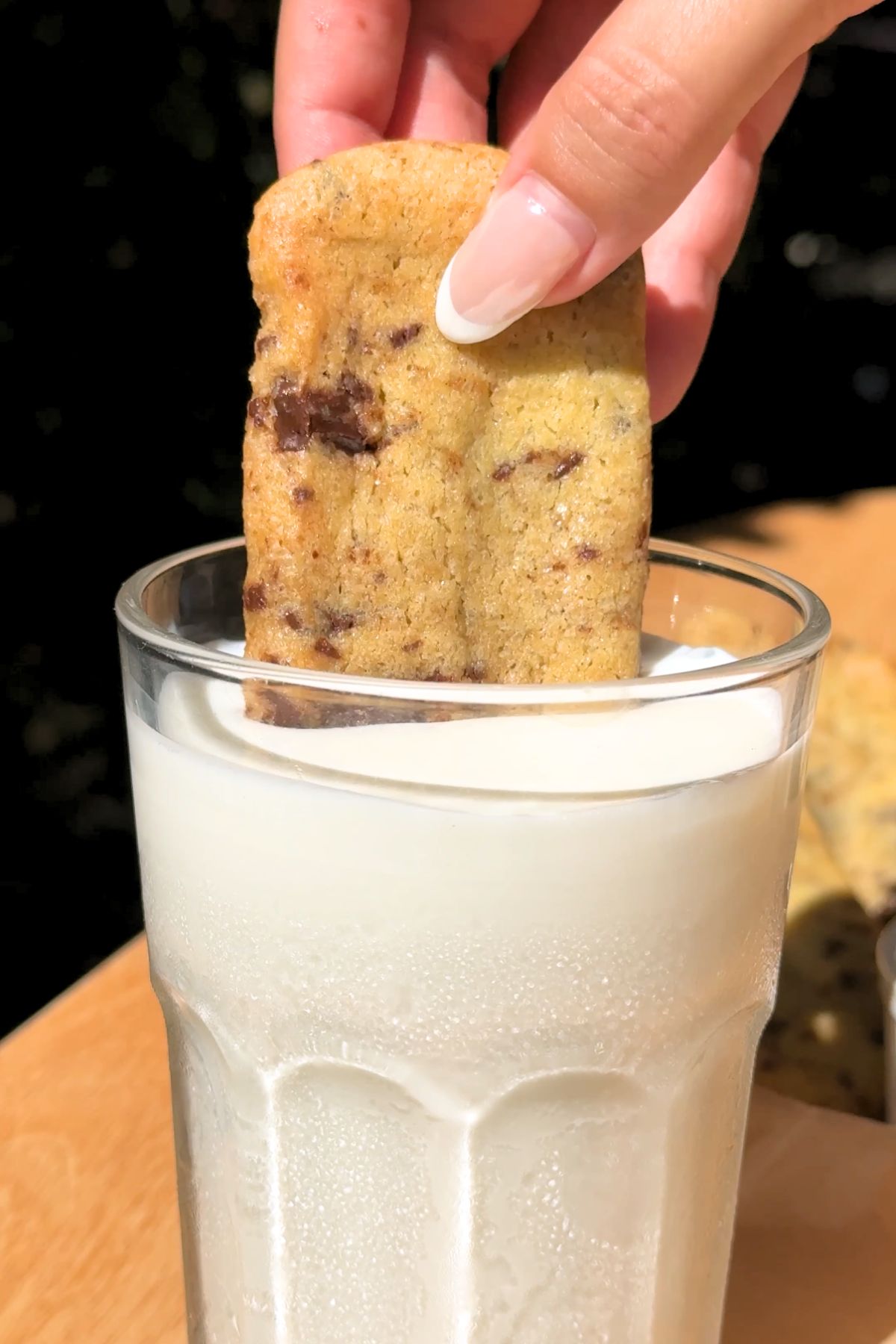 Chocolate chip cookie fry dipped into cold milk.