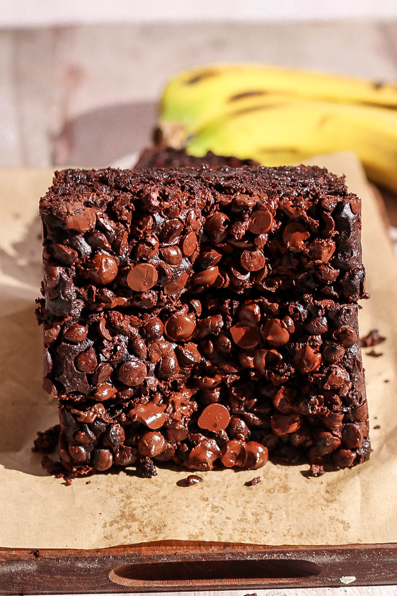 Stack of 3 slices of double chocolate banana bread.