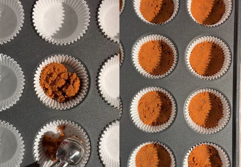 Side-by-side process shot showing a scoop of Biscoff crumb mixture placed into cupcake liners on the left, and pressed down into firm crust bases inside a muffin tin on the right.