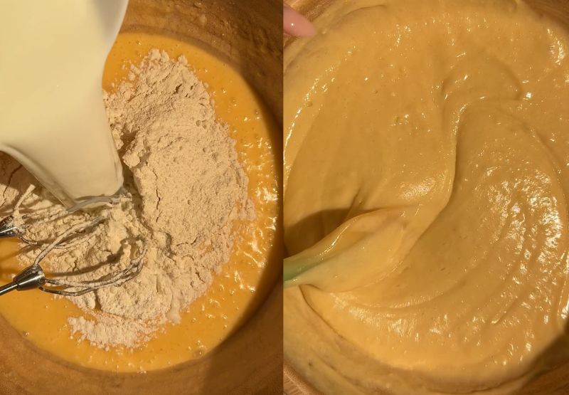 Pouring flour into the wet mixture and folding the batter together with a spatula.